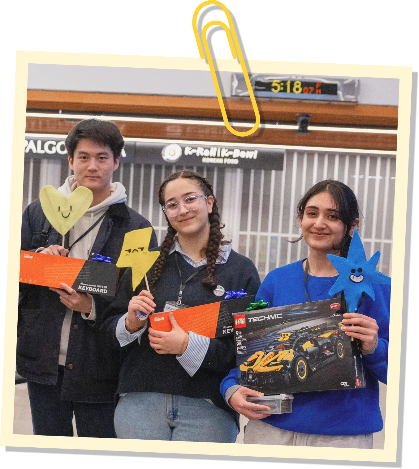 Three Hackville winners holding their prizes